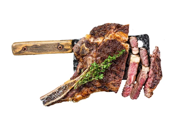 Dry aged grilled Tomahawk or cowboy beef meat steak on a meat cleaver. Isolated, white background