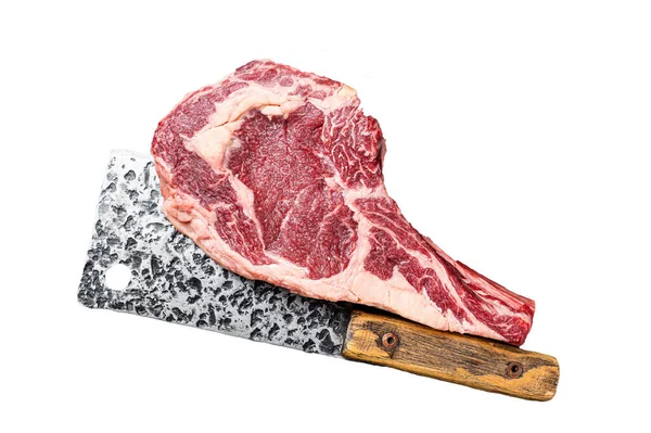 Dry aged Tomahawk rib eye steak, raw beef meat on butcher table. Isolated, white background