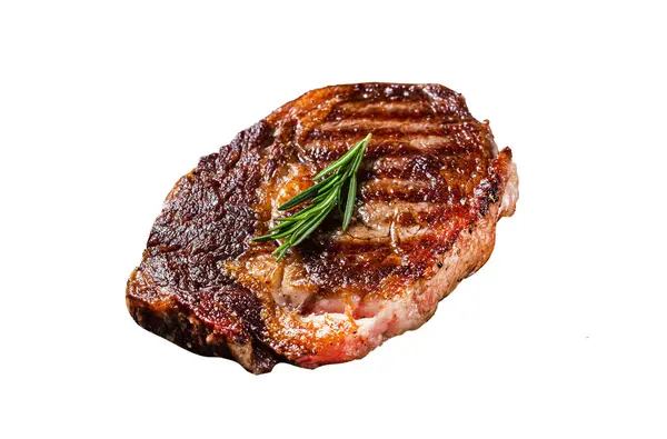 Roasted rib eye steak, ribeye beef meat in a grill pan. Isolated on white background