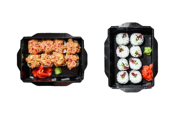 The sushi rolls in the delivery package, ordered in sushi take-out restaurant. Isolated on white background. Top view