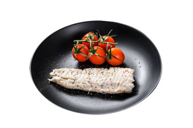 Çeri domatesli buğulanmış morina filetosu. Beyaz arka planda izole edilmiş. Üst görünüm