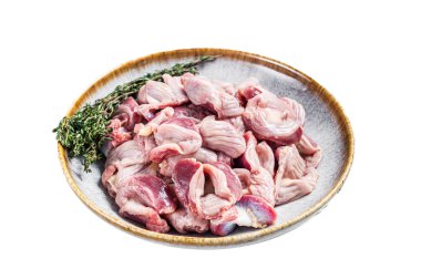 Çiğ tavuk mideleri ve şifalı bitkiler. Beyaz arkaplanda izole