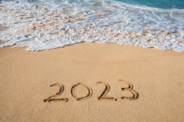 Kum-Yeni Yıl kavramında 2023 yazılıydı.