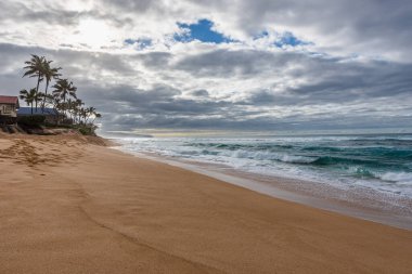 Waves crashing on the shore of Sunset Beach on the North Shore of Oahu, Hawaii