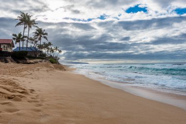 Waves crashing on the shore of Sunset Beach on the North Shore of Oahu, Hawaii
