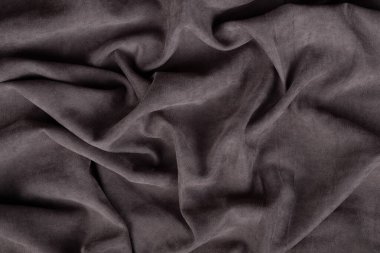 Gri buruşuk tekstil kumaş arkaplanı.