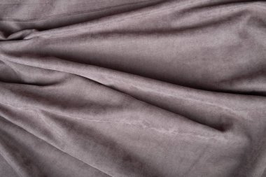 Gri buruşuk tekstil kumaş arkaplanı.