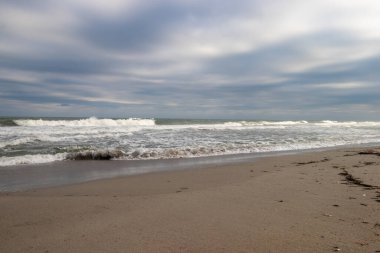 Waves crashing on a sandy beach in North Carolina