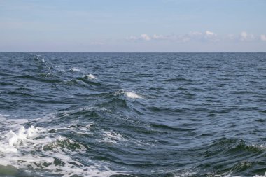 Cloudy sky over the ocean's surface