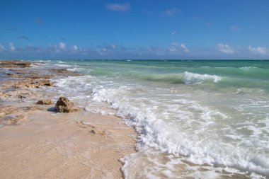 Ocean waves on a rocky beach on Grand Bahama Island