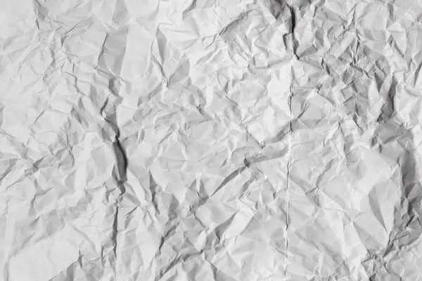 皱皱巴巴的白纸的纹理 — 图库照片