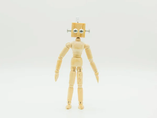 Küçük Orijinal Manken Robot Tahta Vidalardan Yapılmış Beyaz Üzerine Izole — Stok fotoğraf