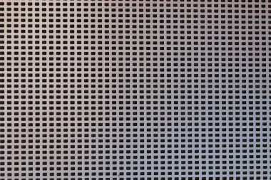 Eski bir hoparlörün ızgarasının ayrıntıları.