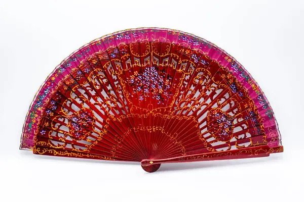Geleneksel İspanyolca açık ahşap yelpaze, farklı motifler ve renklerle boyanmış.