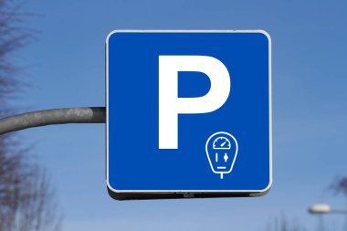 blue paid parking sign 