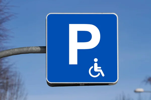 European reserved parking sign, disabled parking only, selective focus