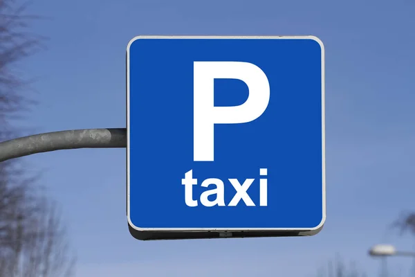 blue taxi parking sign