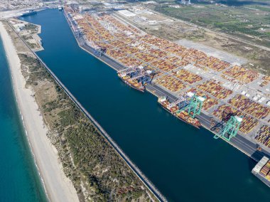 Aerial view of the port of Gioia Tauro, Calabria Italy. Goods loading and unloading operations. Container. Import and export. Global trade. Movement of goods by ship. Transportation. 31-08-2022 clipart