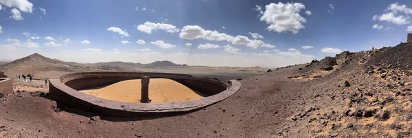 stock image Merzouga, Erg Chebbi dunes, Morocco, Africa, 19-03-2023: panoramic view in the Sahara desert at the fossil mines in the Black Mountain area, blue sky and white clouds