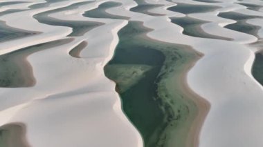 Aerial view of Lencois Maranhenses. White sand dunes with pools of fresh water. Desert. Barreirinhas. Maranhao State National Park. Brazil