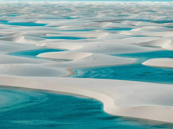 Aerial view of Lencois Maranhenses. White sand dunes with pools of fresh and transparent water. Desert. Barreirinhas. Maranhao State National Park. Brazil