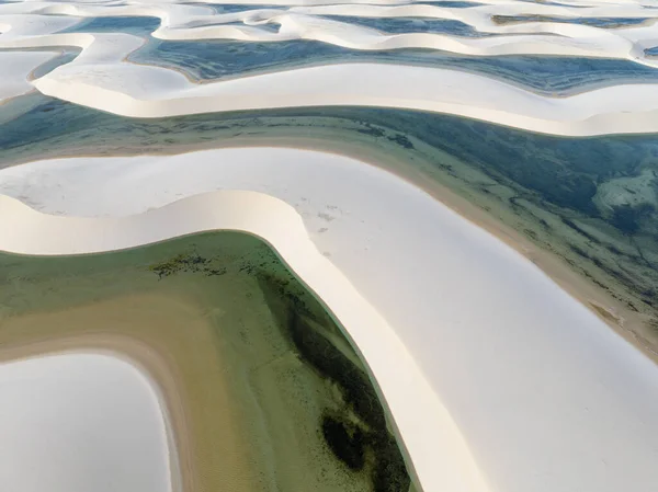 Aerial view of Lencois Maranhenses. White sand dunes with pools of fresh and transparent water. Desert. Barreirinhas. Maranhao State National Park. Brazil