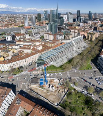 Aerial view of of Milan, skyscrapers. Palazzo Lombardia and Bosco Verticale. Unicredit tower, Unipol tower. Pyramid roof. Excavations and foundations of the Resistance museum 04-02-2024. Italy clipart