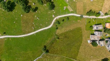 Aerial view of Val di Mello, a green valley surrounded by granite mountains and woods, renamed the Italian Yosemite Valley by nature lovers. Val Masino, Valtellina, Sondrio. Italy clipart