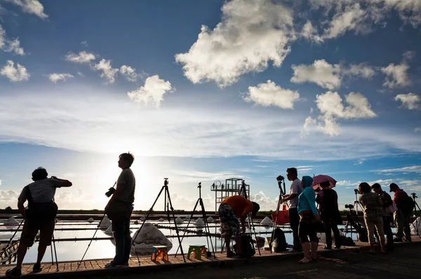 stock image Many photographers are shooting sunset scenery at the Jingzaijiao Tile-Paved Salt Fields in Tainan, Taiwan.