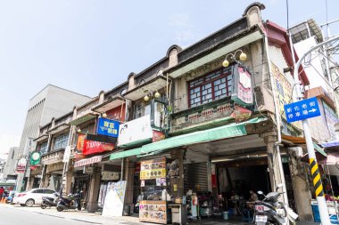 Tainan, Taiwan- April 10, 2022: Tourists visit the Xinhua old street in Tainan, Taiwan. which was the Baroque style of buildings during the Japanese rule of Taiwan. clipart