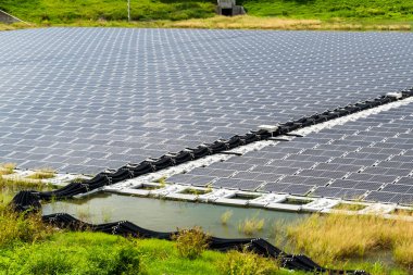 View of the floating Solar power system on the flood detention basin in Kaohsiung, Taiwan. clipart