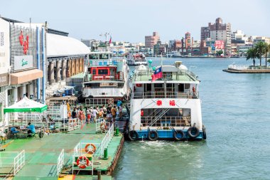 Kaohsiung, Taiwan- June 19, 2022: The ferry at the Gushan Ferry Pier of Kaohsiung in Taiwan is waiting for tourists to board. clipart