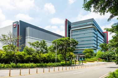 Hsinchu City, Taiwan- August 19, 2022: Taiwan Semiconductor Manufacturing Company (TSMC) plant in Hsinchu Science Park, Taiwan, TSMC is the world's largest dedicated independent semiconductor foundry. clipart