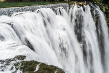 Close-up of the Waterfall at Shifen Scenic Area in New Taipei City, Taiwan. clipart