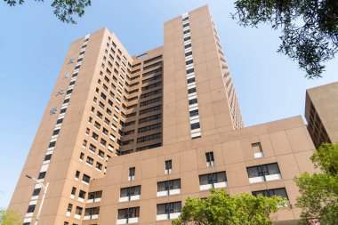 Kaohsiung, Taiwan- February 27, 2023: Building view of Kaohsiung Medical University Chung Ho Memorial Hospital in Taiwan. The hospital provides general medical and surgical hospital services. clipart