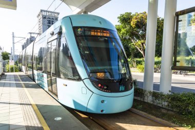 New Taipei City, Taiwan- November 22, 2023: The Danhai Light Rail transit (LRT) train stops at Binhai Yishan Station in New Taipei City, Taiwan.