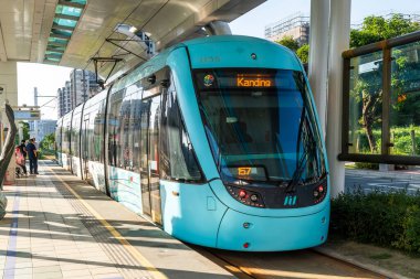 New Taipei City, Taiwan- November 22, 2023: The Danhai Light Rail transit (LRT) train stops at Binhai Yishan Station in New Taipei City, Taiwan.