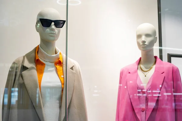 Female mannequins in women fashion store, Sale of clothes