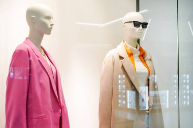 Female mannequins in women fashion store, Sale of clothes