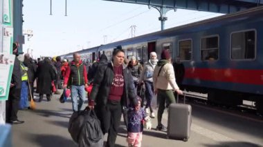 Budapest, Hungary - March 09, 2022: Ukrainian refugees from Ukraine arrived to Railway Station, attempting to escape war against Ukraine