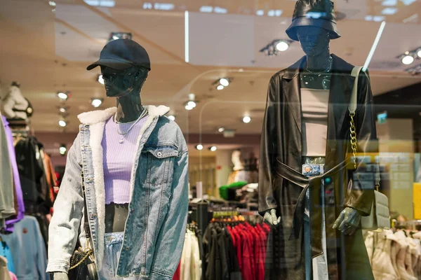 Female mannequins in women fashion store, Sale of clothes