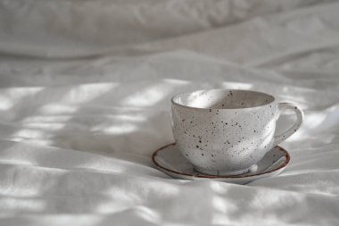 Cozy bed with a cup in the morning, breakfast in bedroom