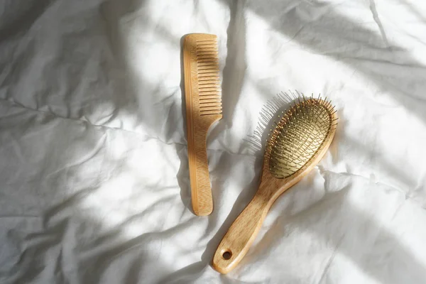 Wooden Hairbrushes White Bed Background Shadows Window — Stock Photo, Image