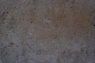 Gri ve kahverengi paslı taş zemin veya metal yüzey dokusu