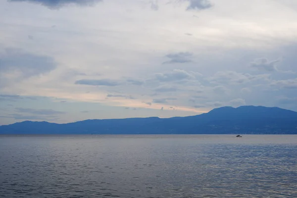 stock image Panoramic view sea and mountains after sunset