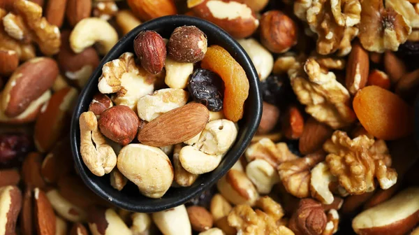 Mix Nuts Dried Fruits Wooden Board Bowl Healthy Sweets Imágenes de stock libres de derechos