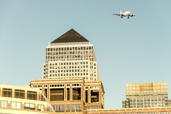 Airplane over Canary Wharf.