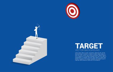 Businessman in suit shoot the arrow to target on step stair. Business Concept of marketing target and customer.