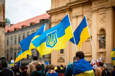 Munich, Bavaria, Germany - 05.08.22: Anti War Protest March Meeting with Ukraine Flags on Central Square of Munich, Germany