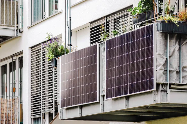 Balcony Solar Panels of Modern Apartment Building. Solar Green Energy of Eco Building.